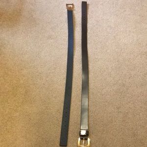 Michael Kors belts one black one brown.